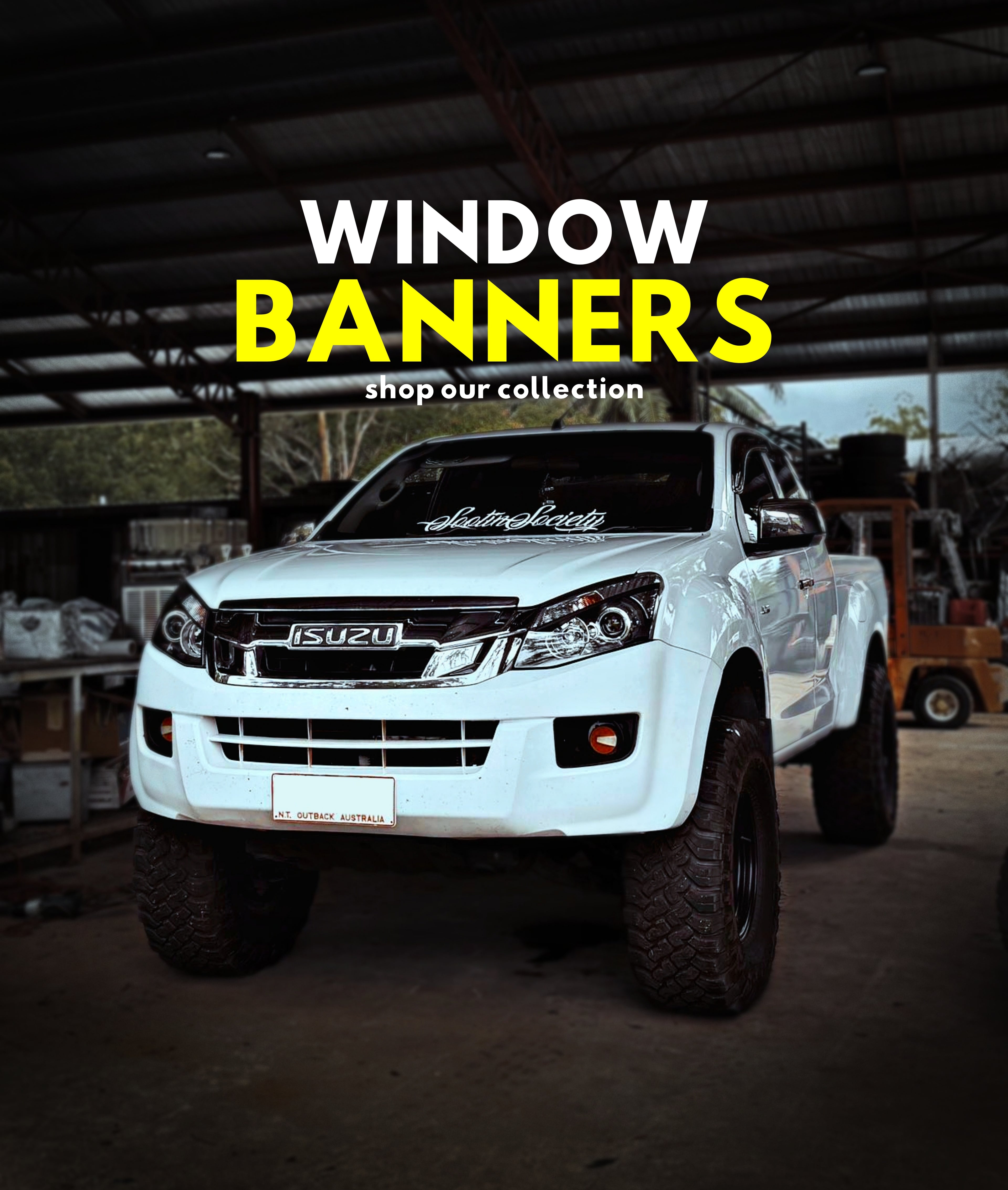4WD vehicle with white Sootin Society window banner sticker on the windshield